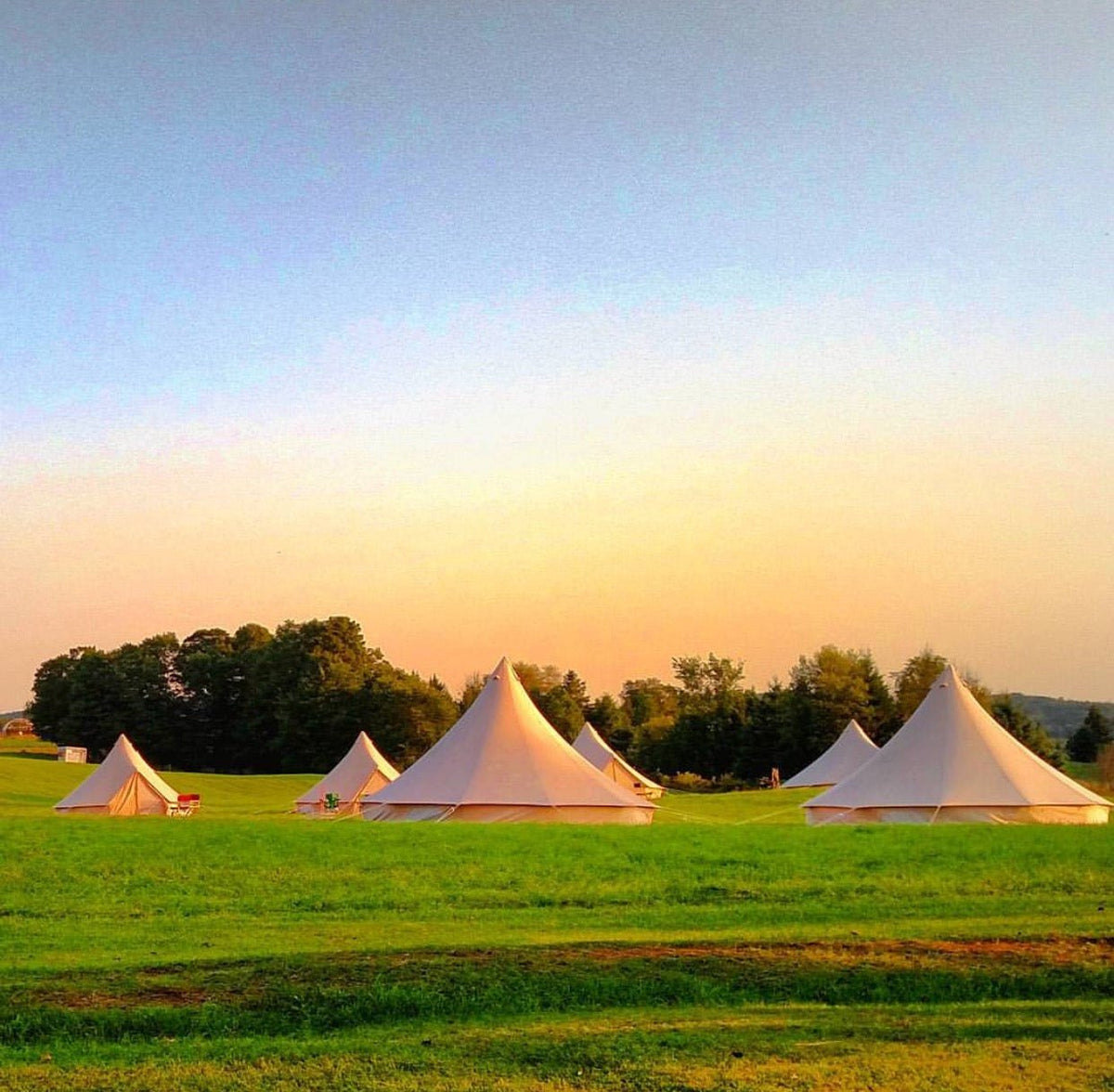 Luxury 6M Stout Bell Tent set up in a classic Texas Hill Country landscape near Fredericksburg.