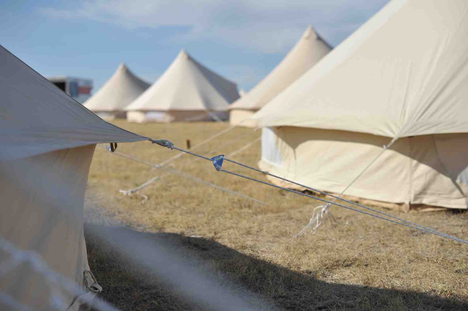 Professional glamping village at The Oasis, Gorge Amphitheatre, featuring a high-traffic layout of Stout Bell Tents.