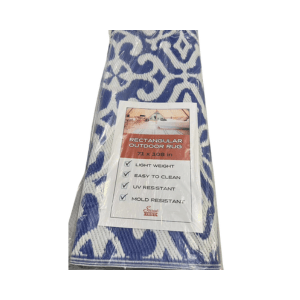 Rectangular rug in package with blue and white pattern on a white background