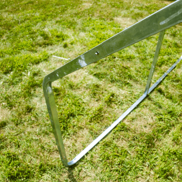 Metal wall tent frame on grass