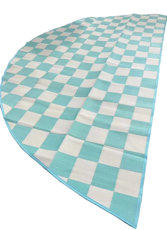 Checkered blue and white rug on a patterned floor