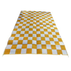 Checkered yellow and white rug on a white background
