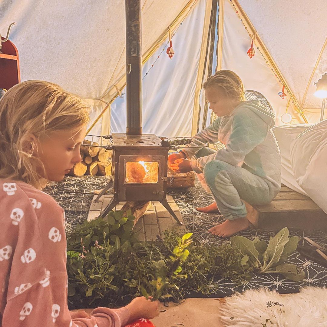 Children living in a Stout Tent bell tent