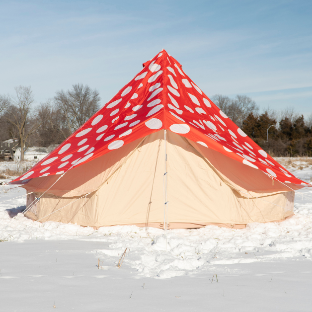 Mushroom rainfly on beige bell tent in a snowy landscape