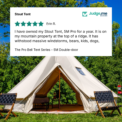 A beige bell tent pitched outdoors on grass with trees and blue sky behind it. Two dark woven camp chairs sit in front, and a large white review card is overlaid at the top with a five-star rating and customer quote for the Stout Tent, with JudgeMe Reviews branding.