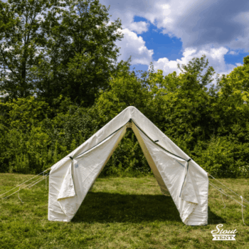 White canvas wall tent by Stout Tent with mesh door and screened windows