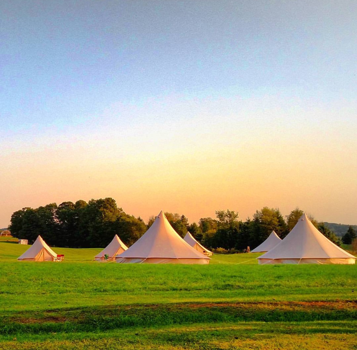 Luxury 6M Stout Bell Tent set up in a classic Texas Hill Country landscape near Fredericksburg.